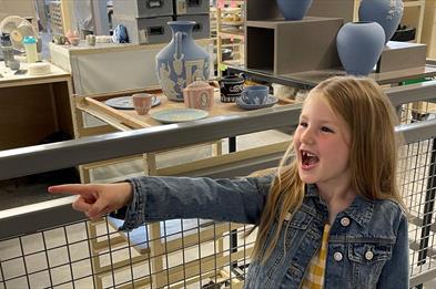 Child in pottery museum