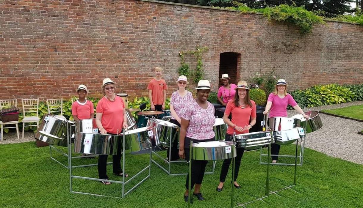 Image of people playing steel drums