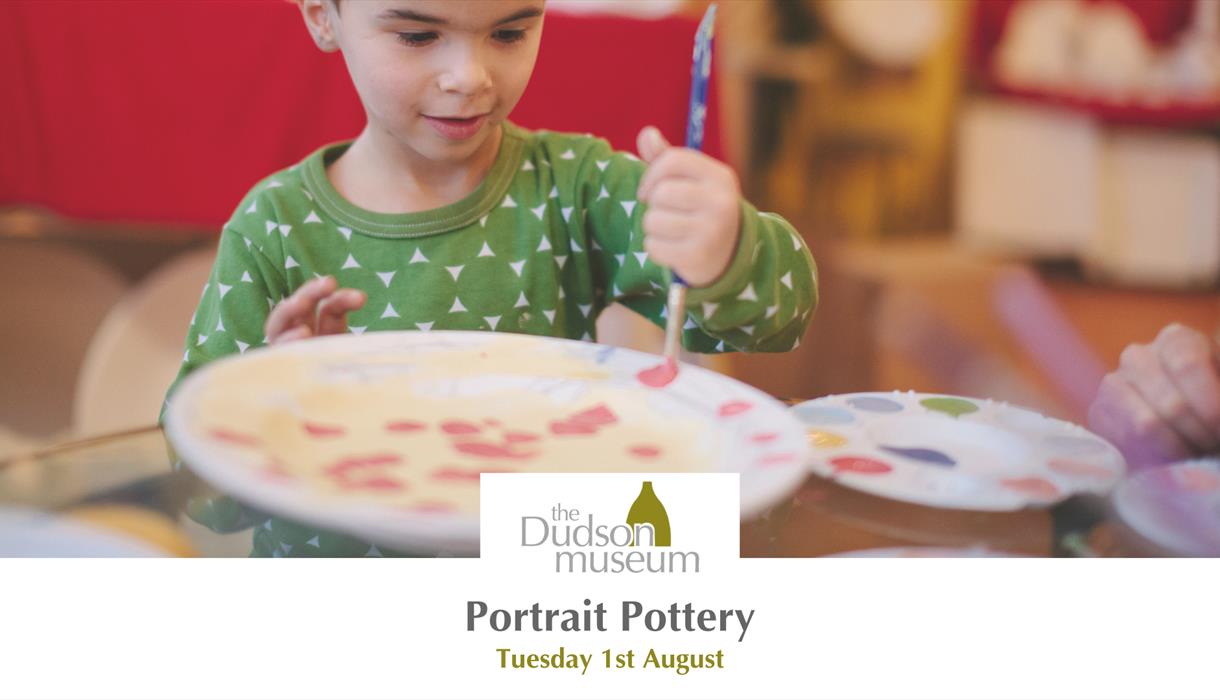Boy painting a plate