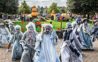 The Alton Ancestors - dancers in spooky costumes - perform a routine