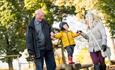 Grandparents and child on the adventure play at Trentham Estate