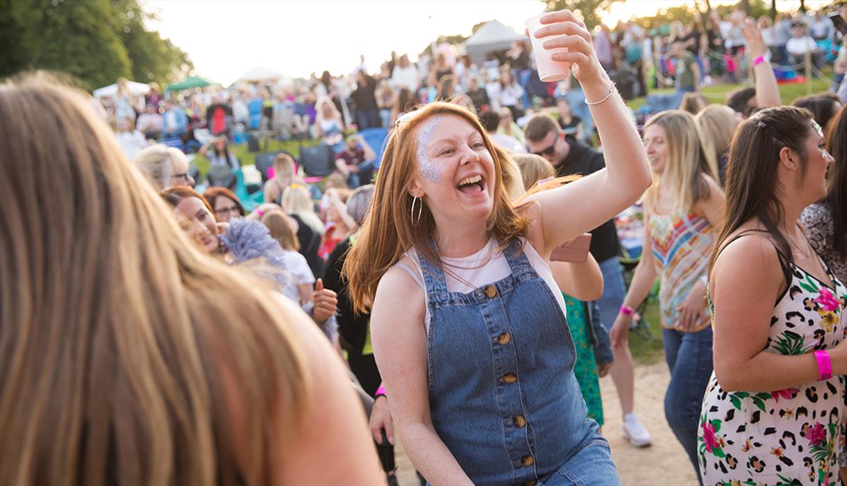 A visitor enjoys great live music at one of The Trentham Estate's Summer Concerts