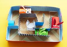 A maze created from card and recycled objects 