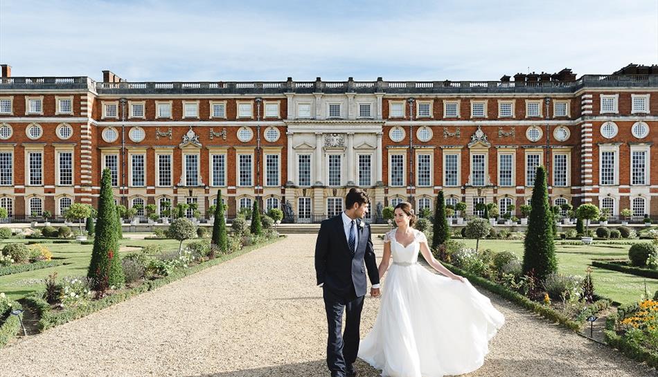 Bride and Groom in Hampton Palace Court grounds