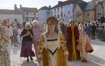 Outside theatre performance with crowds