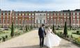 Bride and Groom in Hampton Palace Court grounds