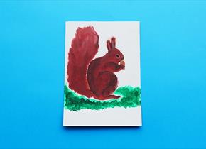 painting of a brown squirrel on a blue background