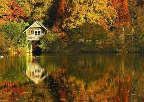 Boat House Autumn Colour - Winkworth Arboretum. Copyright National Trust