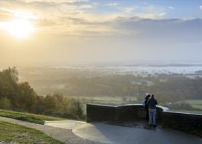 Walkers stood on the Salomons Memorial viewpoint at Box Hill, Surrey. ©National-Trust-Images