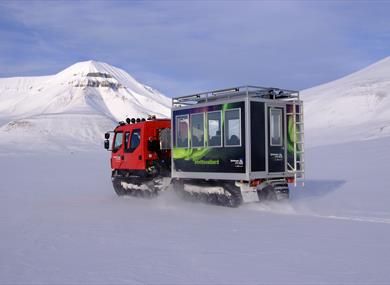 Snowcat driving in snow