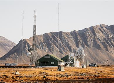 Isfjord Radio with mountains in the background