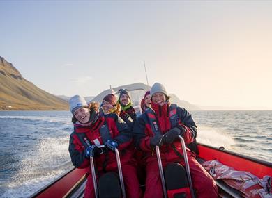 Guests having fun on board a RIB boat