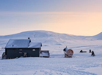 Juva Cabin in daylight on a wintery day