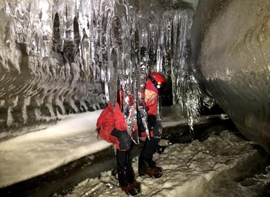 Person visiting the ice caves