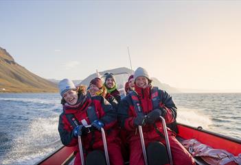 Guests having fun on board a RIB boat