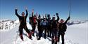 A tour group on top of a mountain