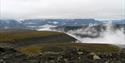 Mountains covered by low clouds and mist