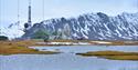 Isfjord Radio with mountains in the background