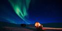 Juva Cabin underneath the northern lights