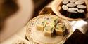 Chocolates produced by Fruene displayed on plates