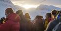 A crowd celebrating the sun's return to Longyearbyen after the dark season