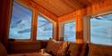 Cozy area inside wilderness cabin.