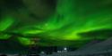 Northern lights above town