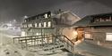 Snow-covered buildings in the centre of Longyearbyen