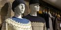 Wool sweaters displayed on mannequins