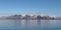Mountainous landscapes alongside a fjord