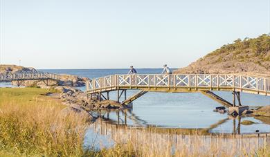 cyclists cycle across the bridge at Krogshavn in Bamble