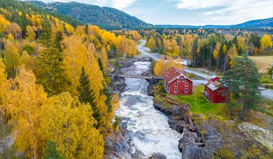 Omnesfossen waterfall and Heddal Mill in Sauland.