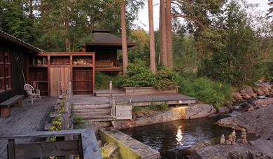 Patio and swimming pool at sauna Fossumsanden camping and cabin rental 