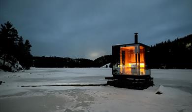 sauna on a frozen lake