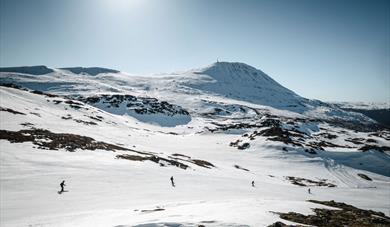 folk på alpinbakke på Gausta skisenter