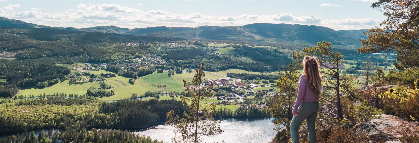 lady enjoying the view from Ramsås in Siljan