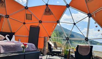 interior and views from arctic dome glamping tent at Norsjø Ferieland