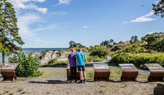 2 boys at the Geopark boards at Rognstranda