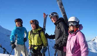 4 personer på ski