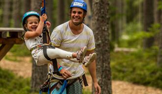 father and daughter have fun at High and Low in Bø in Telemark