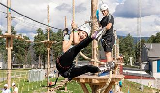 girl having fun in the climbing park in Skien leisure park