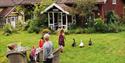 guests enjoying themselves at the herb farm Auen urtegård