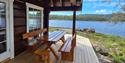 cottage with terrace and view over the lake