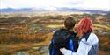 couple looking out over landscape at Vinje