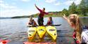 people having fun kayaking