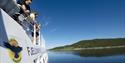 passengers on MB Fjellvåken look over lake Møsvatn