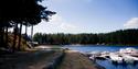 pier with leisure boats at Telnessanden camping