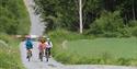 group of cyclists cycling on the cycle route "Bjønnerunden Ulefoss"