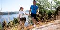 Man and woman walking on Bjørkøya in Porsgrunn.