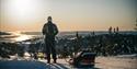 man goes cross-country skiing with sled behind him at Lifjell ski center in Bø